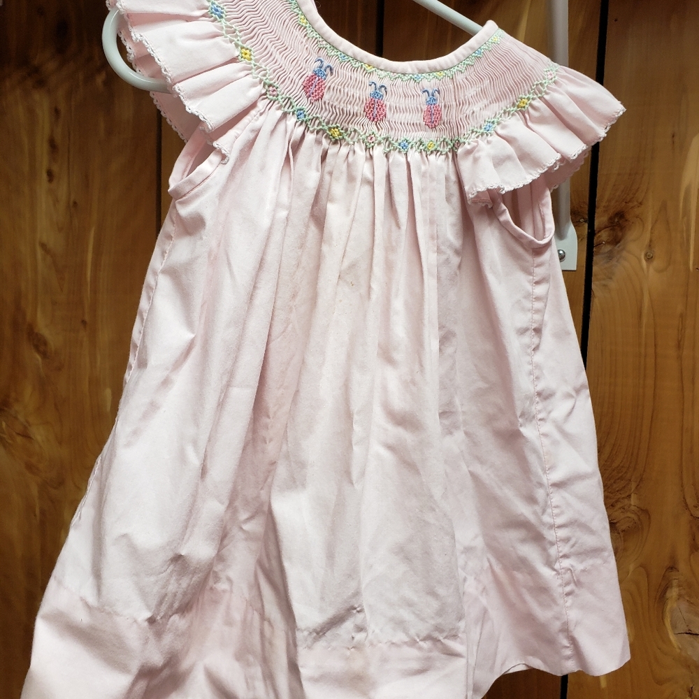 Light pink ladybug smocked dress